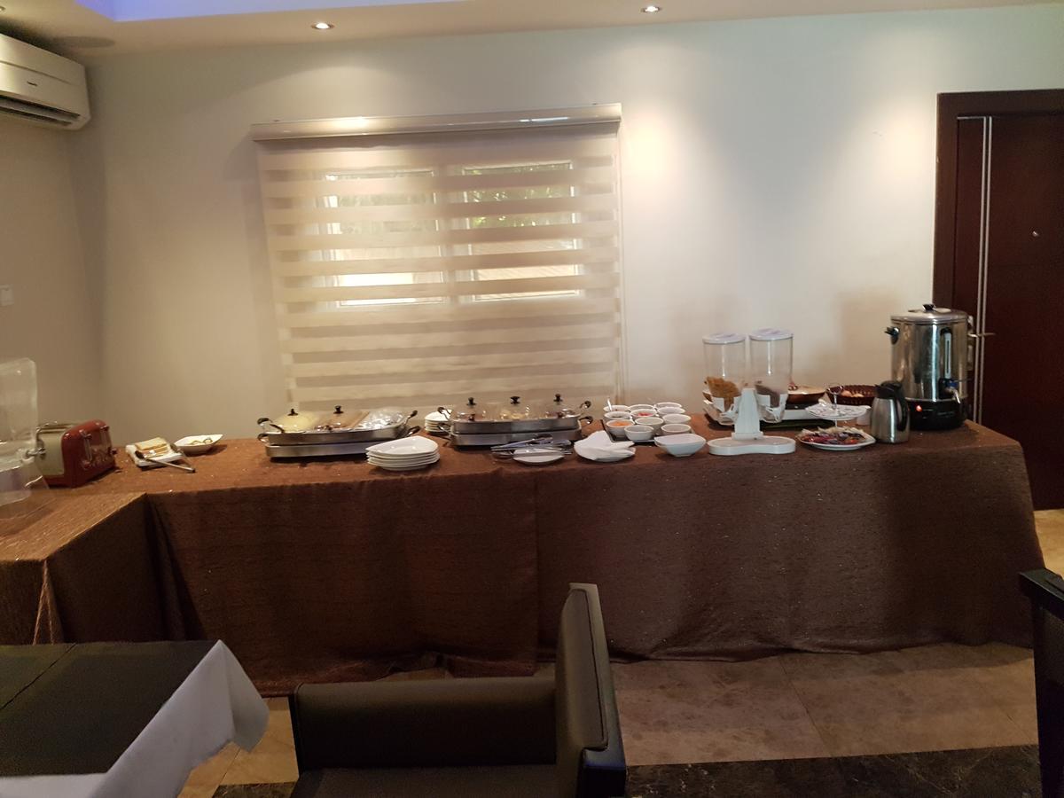 Check Inn Hotel 阿布贾 外观 照片